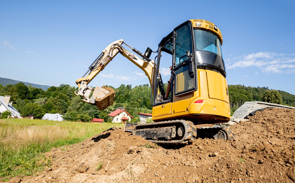 Mini,Excavator,Digging,Preparing,Ground,Under,Home,Garden